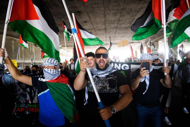 People walk beneath the Interstate 405 motorway as they demonstrate in support of Palestine during the Los Angeles Nakba 73: Resistance Until Liberation rally and protest from the US Federal Building to the consulate of Israel. AFP
