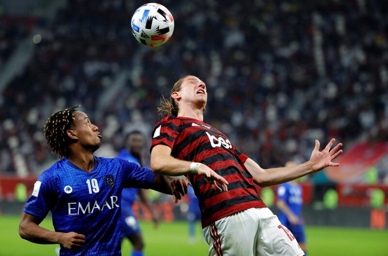Flamengo's Filipe Luis in action with Al Hilal's Andre Carrillo at the Club World Cup in Doha. Reuters