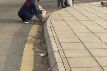 Members of Saudi Arabia’s Hejaz Ploggers collect rubbish during their jogs. Courtesy Hejaz Ploggers