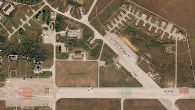 A satellite image by Planet Labs PBC shows aircraft at Saki Air Base before an explosion struck on Tuesday, August 9, 2022. Planet Labs PBC via AP