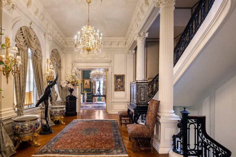 The mansion’s eight floors are connected by a mahogany staircase and wood-panelled lift.