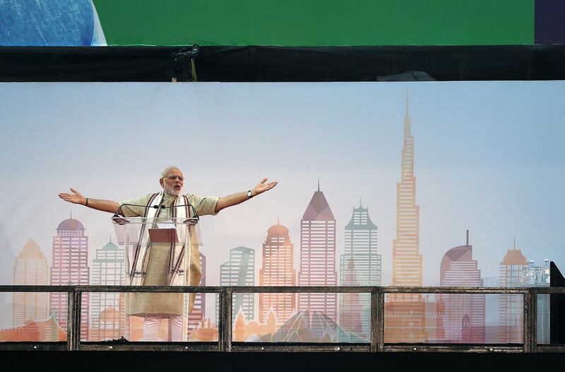 Indian prime minister Narendra Modi holds the crowd of 50,000 expatriates in the palm of his hands at Dubai International Cricket Stadium on Monday night. Pawan Singh / The National