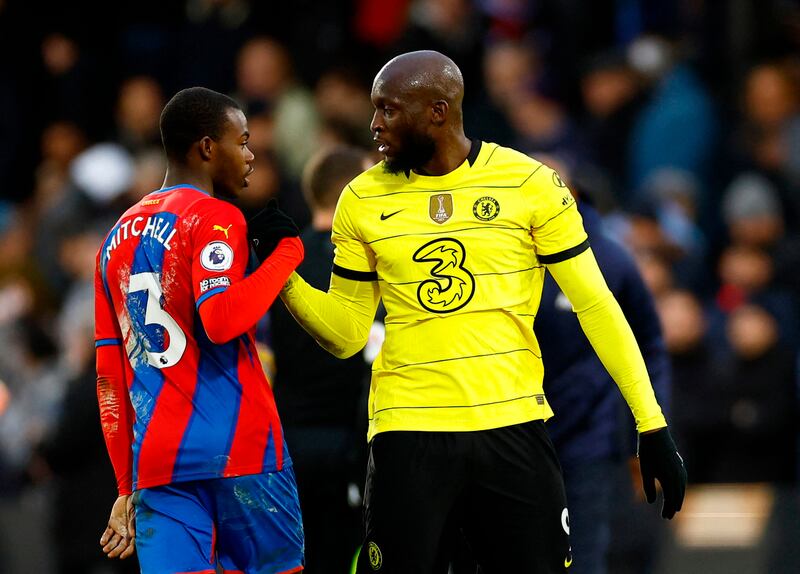 Crystal Palace's Tyrick Mitchell with Chelsea's Romelu Lukaku after the match at Selhurst Park. Reuters