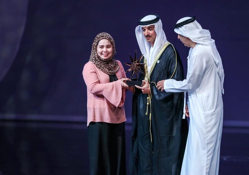 Abu Dhabi, U.A.E., November 20, 2018.  
Sheikha Fatima bint Mubarak Awards for Motherhood and Childhood.--  Outstandinfg Nanny Award is given to Rosemarie Salmorine from the Philippines by H.H. Sheikh Hazza bin Zayed bin Sultan Al Nahyan.
Victor Besa / The National
Section:  NA
Reporter:  Shireena Al Nowais