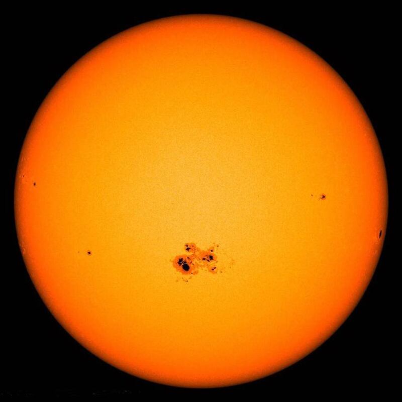 A gigantic sunspot – almost 80,000 miles across -- can be seen on the lower center of the sun in this image from NASA’s Solar Dynamic Observatory captured on Oct. 23, 2014. This active region, named AR2192, is the largest of the current solar cycle. Ten Earth's could be laid across its diameter. Credit: NASA/SDO