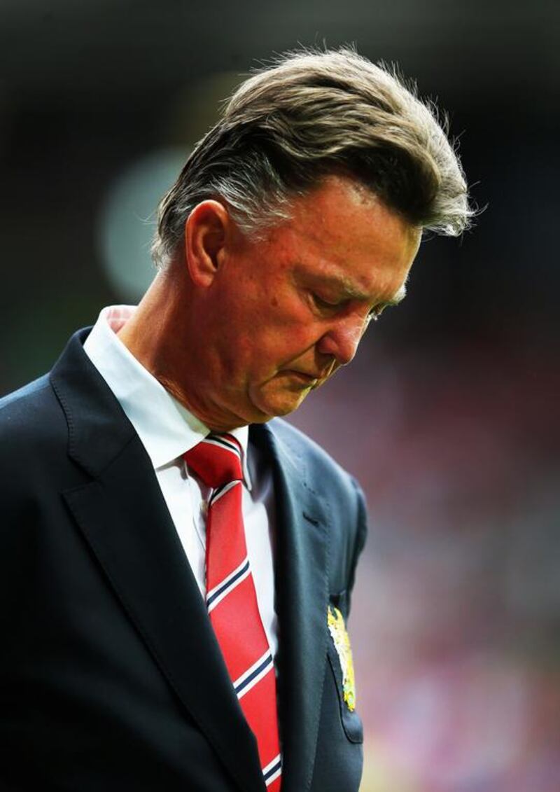Manchester United Manager Louis van Gaal looks on prior to the Premier League match between Manchester United and Swansea City at Old Trafford on August 16, 2014 in Manchester, England.  (Photo by Alex Livesey/Getty Images)
