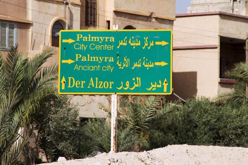 A road sign is pictured in Palmyra in May 2015, the same month ISIL first seized the city. Stringer / File Photo / Reuters