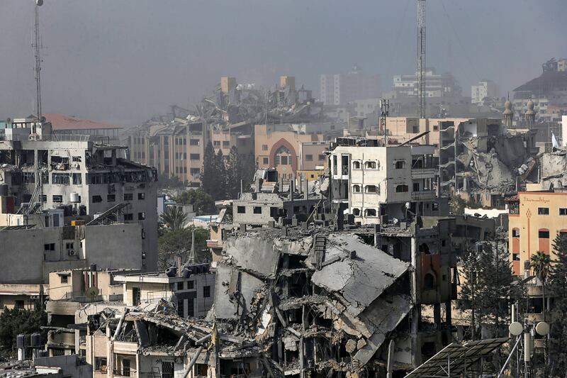 Destroyed buildings in Al Remal neighbourhood after Israeli air strikes on Gaza city. EPA