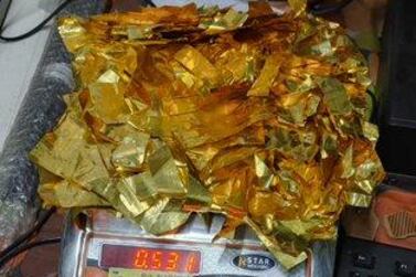 Customs at an Indian airport recovered 531.20 grams of gold foils hidden inside chocolate boxes. Courtesy: Asian News International 