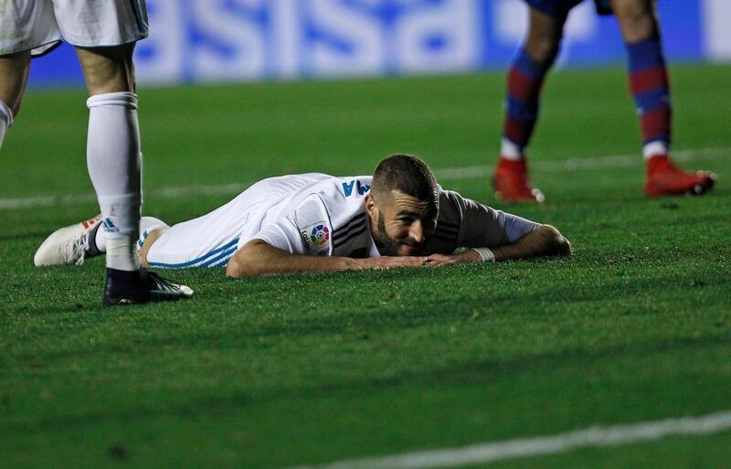 Real Madrid's Karim Benzema reacts after failing during the Spanish La Liga soccer match between Levante and Real Madrid at the Ciutat de Valencia stadium in Valencia, Spain, Saturday, Feb. 3, 2018. (AP Photo/Alberto Saiz)