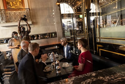 London Mayor Sadiq Khan speaks with management of the Wolseley restaurant. Getty