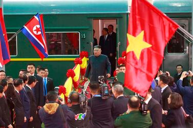North Korean leader Kim Jong-un steps off the train to be welcomed at Dong Dang Railway Station, to start his visit to Vietnam ahead of the US-North Korea summit hosted in Hanoi. EPA