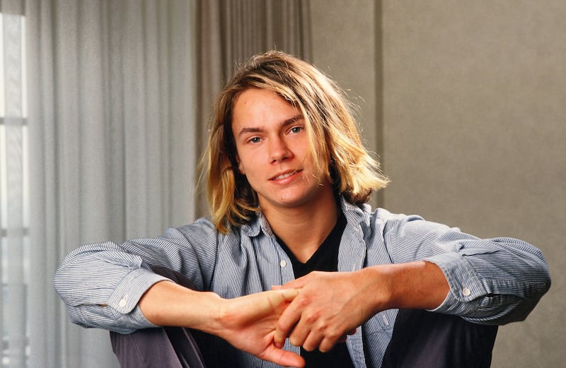 LOS ANGELES, CA - 1988:  Actor River Phoenix (1970 - 1993), star of "Stand By Me," playfully poses during a 1988 Los Angeles, California, photo portrait session. Phoenix, a rising young film star, tragically died in 1993 outside a Sunset Strip nightclub of a drug overdose. (Photo by George Rose/Getty Images)