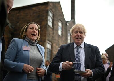 UK International Trade Secretary Anne-Marie Trevelyan with Prime Minister Boris Johnson. Ms Trevelyan said UK businesses of 'all shapes and sizes' would benefit from an enhanced deal. PA