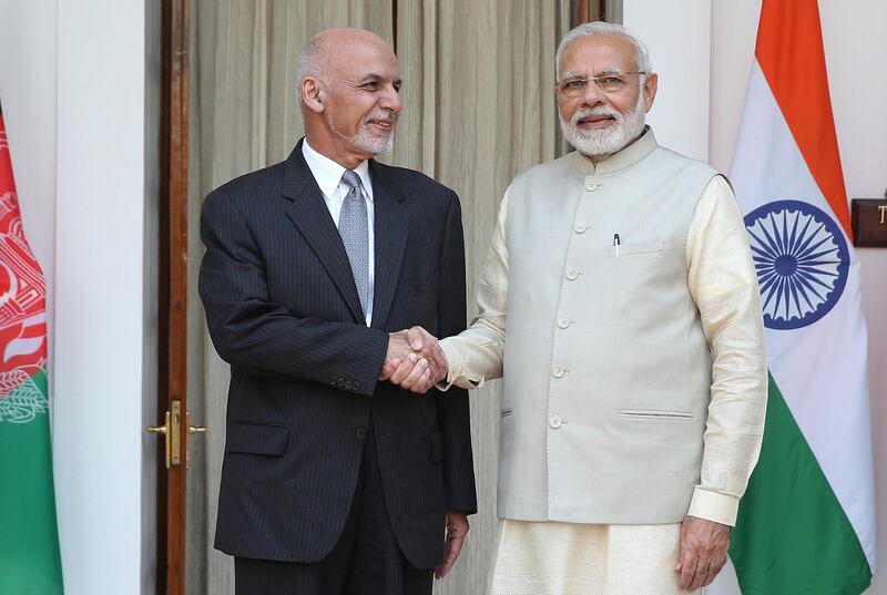 Indian Prime Minister Narendra Modi shakes hands with Afghan president Mohammad Ashraf Ghani in New Delhi.  EPA