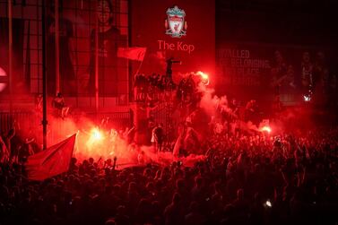 LIVERPOOL, ENGLAND - JUNE 25: Football fans celebrate at Anfield Stadium as Liverpool FC win the Premier League title after Chelsea beat Manchester City tonight ensuring Liverpool FC can no longer be overtaken on points on June 25, 2020 in Liverpool, England. Liverpool have won 18 league championships already with the last title win in 1989-90 under Kenny Dalglish. (Photo by Christopher Furlong/Getty Images)