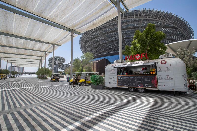 Buggy taxis wait to take guests around the site. 