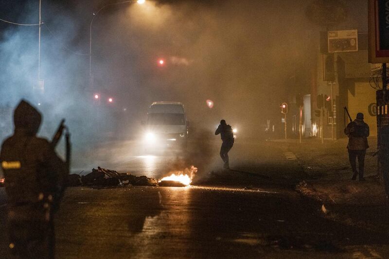 A van is brought to a stop by officers in Jeppestown..Mr Zuma, 79, was sentenced for defying a Constitutional Court order to give evidence at an inquiry investigating alleged high-level corruption during his nine years in office up to 2018.