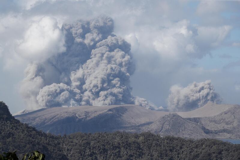 Ash spews into the air from the Taal Volcano in Tanuan, Batangas, Philippines.  EPA