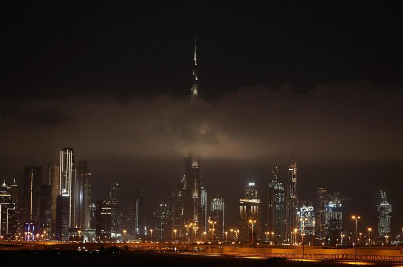 
DUBAI, UNITED ARAB EMIRATES , April 15 – 2020 :-  Clouds covering the Burj Khalifa after the rain in Dubai. (Pawan Singh/The National) For News/Standalone/Online/Instagram/Big Picture
