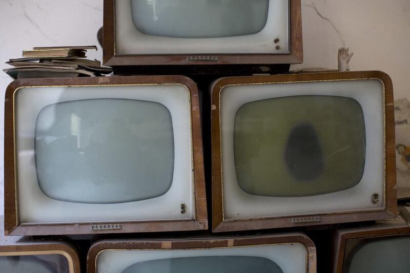 Old televisions found and collected by soldiers.