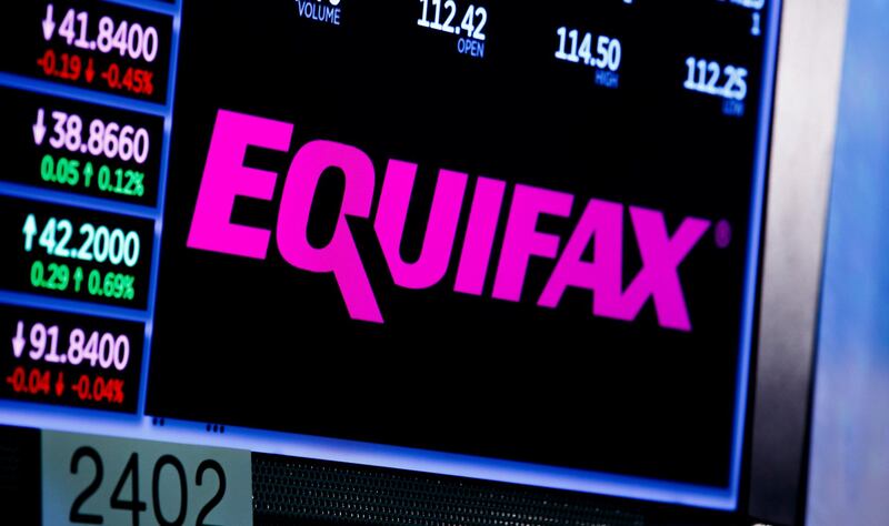 epa06200064 A view of a sign for the company Equifax on the floor of the New York Stock Exchange in New York, New York, USA, on 12 September  2017. The company recently disclosed that a data breach, discovered in July 2017, may have impacted as many as 143 million consumers in the United States. Equifax is one of the three main organizations in the US that calculates credit scores and has access to personal information including names, Social Security numbers, birth dates, addresses, some driver's license, and credit card numbers.  EPA/JUSTIN LANE