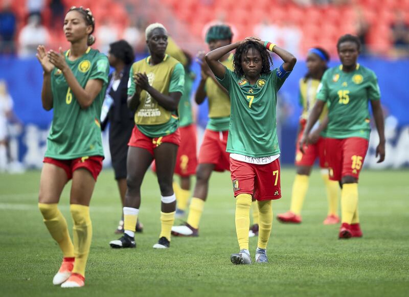 VALENCIENNES, FRANCE - JUNE 23: Gabrielle Aboudi Onguene of Cameroon looks dejected following the 2019 FIFA Women's World Cup France Round Of 16 match between England and Cameroon at Stade du Hainaut on June 23, 2019 in Valenciennes, France. (Photo by Marc Atkins/Getty Images)