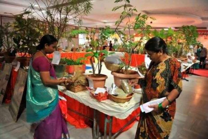 Indian women attend the Ayurvedic fair in Hyderabad. For centuries, Indian housewives have used homemade remedies.