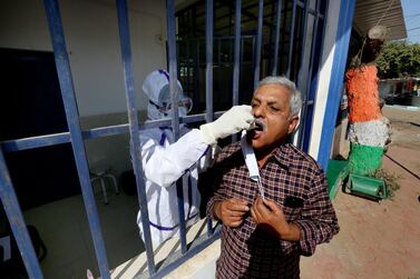 A man is tested for Covid-19 at a clinic in Bhopal, India. India has the second-highest tally of confirmed cases in the world. EPA