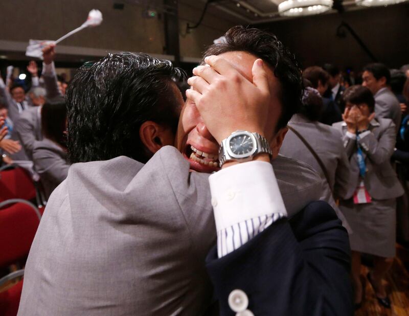 Japanese fencer Yuki Ota cries as Jacques Rogge President of the International Olympic Committee (IOC) announces Tokyo as the city to host the 2020 Summer Olympic Game during a ceremony in Buenos Aires September 7, 2013.       REUTERS/Marcos Brindicci (ARGENTINA - Tags: SPORT OLYMPICS) *** Local Caption ***  BAS367_OLYMPICS-202_0907_11.JPG