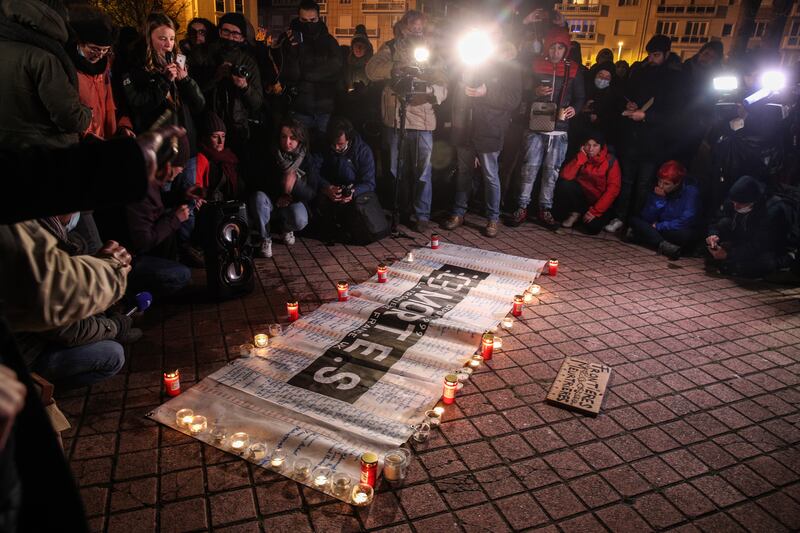 A vigil was held for those killed crossing the English Channel on Wednesday. EPA