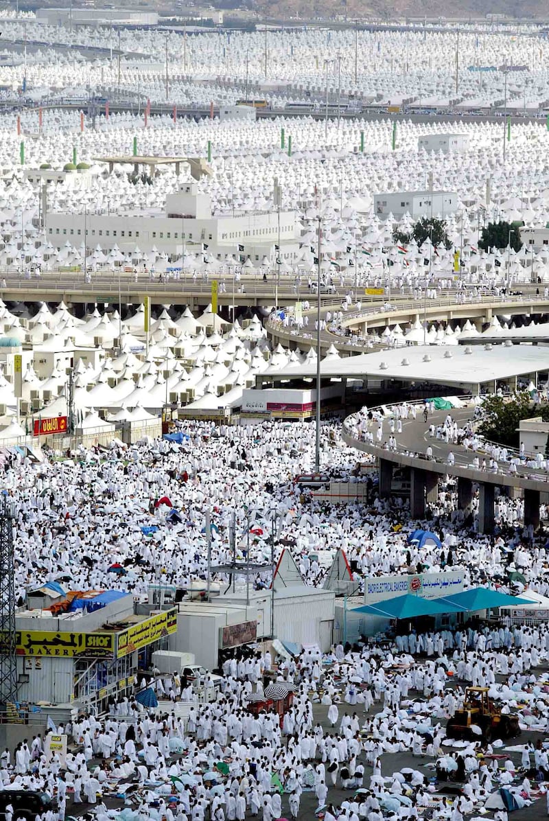 Millions of pilgrims participating in Hajj in 2004 arrive in Mina to camp in what was called the largest tent city in the world.