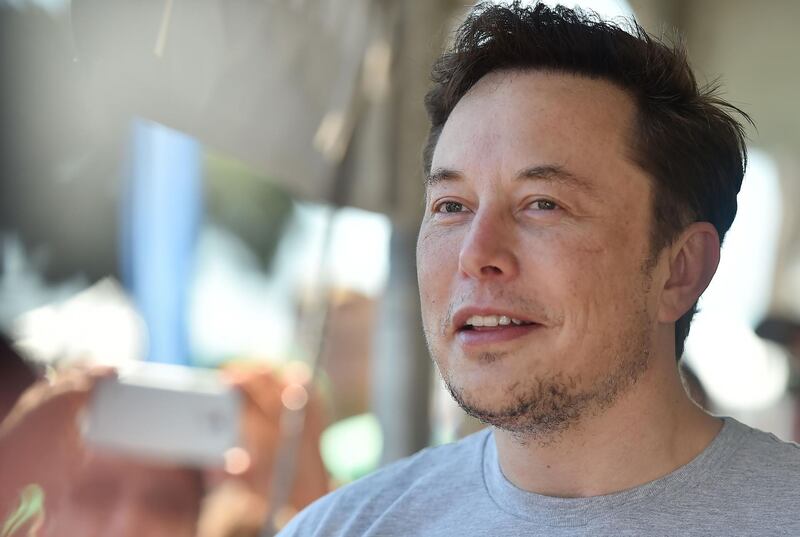SpaceX, Tesla and The Boring Company founder Elon Musk attends the 2018 SpaceX Hyperloop Pod Competition, in Hawthorne, California on July 22, 2018.  Students from colleges and universities from the US and around the world are taking part in testing their pods on a 1.25 kilometer-long (0.75-mile) tubular test track at the SpaceX headquarters.
 / AFP / Robyn Beck
