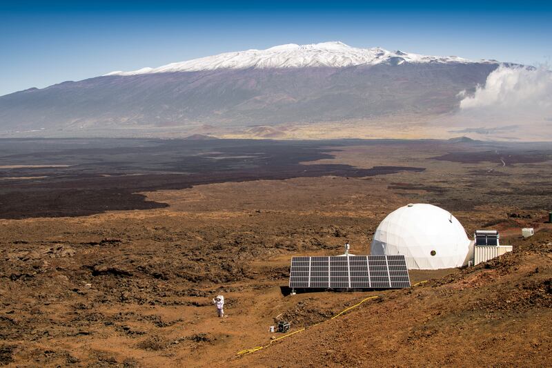 TO GO WITH AFP STORY by Kerry SHERIDAN, "Year-long Mars simulation to begin in Hawaii"
This March 10, 2015, image courtesy of the University of Hawaii at Manoa shows the exterior of the HI-SEAS habitat on the northern slope of Mauna Loa in Hawaii. Six people are about to shut themselves inside a dome in Hawaii for a year, in the longest US isolation experiment yet aimed at helping NASA prepare for a pioneering journey to Mars. They are based on a barren, northern slope of Mauna Loa, living inside a dome that is 36 feet (11 meters) in diameter and 20 feet (six meters) tall. In a place with no animals and little vegetation around, they will close themselves in at 3:00 pm Hawaii time on August 28, 2015, (0100 GMT, August 29 Saturday), marking the official start to the 12-month mission. The men and women have their own small rooms, with space for a sleeping cot and desk, and will spend their days eating foods like powdered cheese and canned tuna, only going outside if dressed in a spacesuit, and having limited access to the Internet.   == RESTRICTED TO EDITORIAL USE / MANDATORY CREDIT: "AFP PHOTO HANDOUT-University of Hawaii at Manoa/Neil Scheibelhut"/ NO MARKETING - NO ADVERTISING CAMPAIGNS – NO A LA CARTE SALES / DISTRIBUTED AS A SERVICE TO CLIENTS == (Photo by Neil Scheibelhut / University of Hawaii at Manoa / AFP)