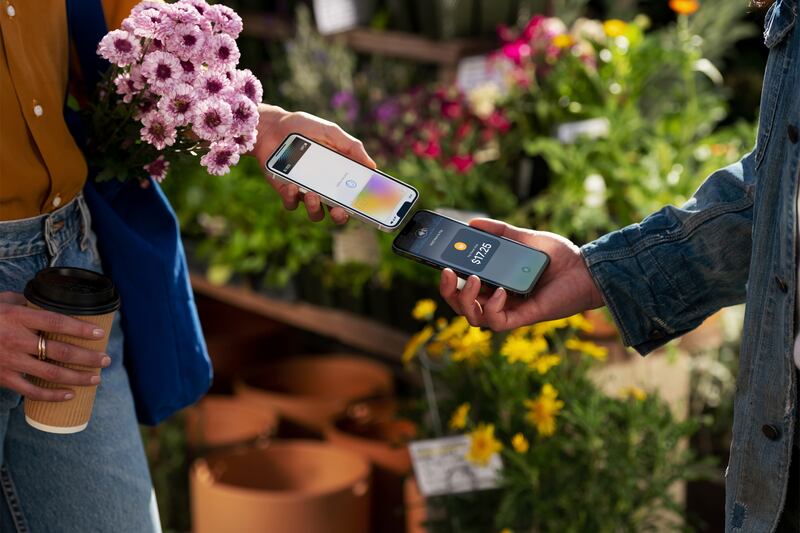 Apple's Tap to Pay works by tapping iPhones together and will also work with contactless cards. Photo: Apple