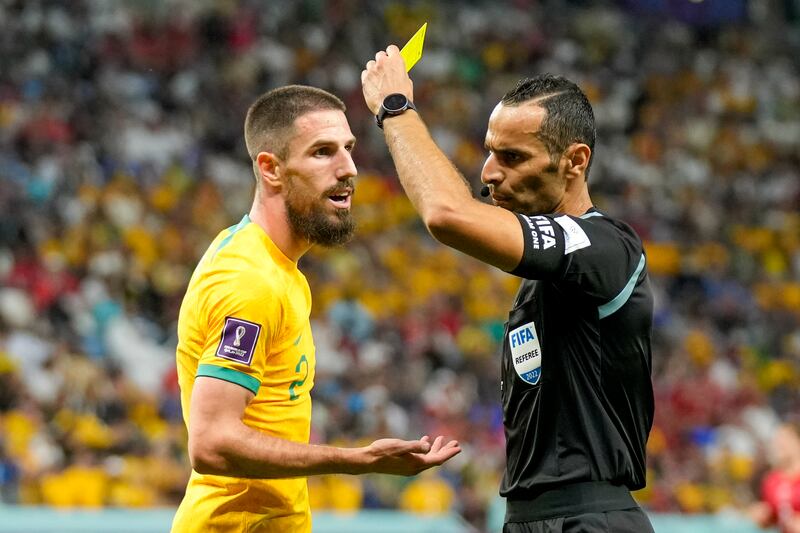 Australia's Milos Degenek is shown a yellow card. AP