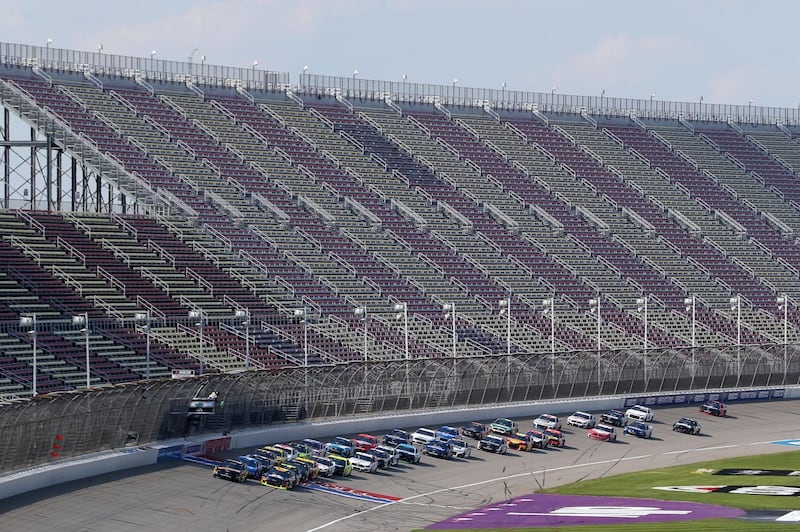 Clint Bowyer and William Byronlead the field to start the NASCAR Cup Series Consumers Energy 400 at Michigan at an empty Michigan International Speedway on Sunday, August 9. AFP