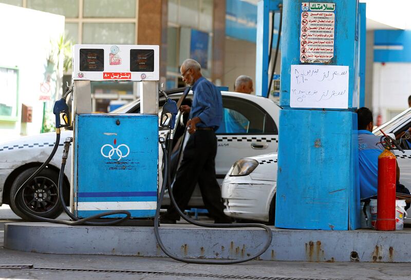 A sign at a petrol station shows the fuel price, in Cairo, Egypt June 29, 2017. The sign reads 'price of 92-octane gasoline has been put up from 3.5 Egyptian pounds per litre to 5 Egyptian pounds. 80-octane, increased to 3.65 pounds per litre from 2.35 pounds per litre'. REUTERS/Mohamed Abd El Ghany