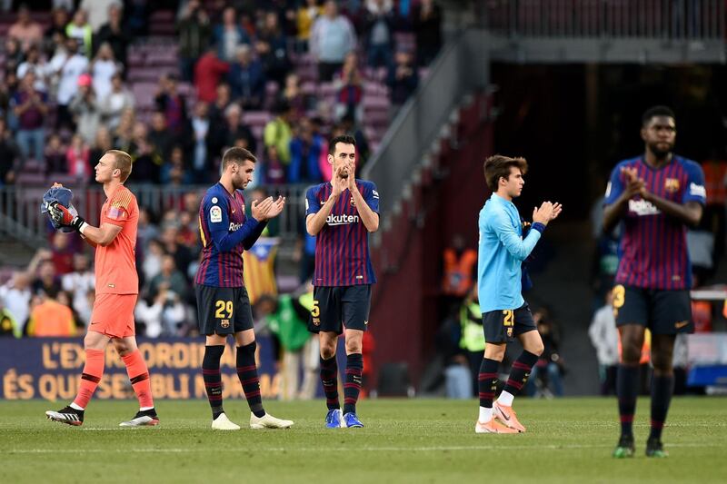 Barcelona's players applaud the fans after the game. AFP