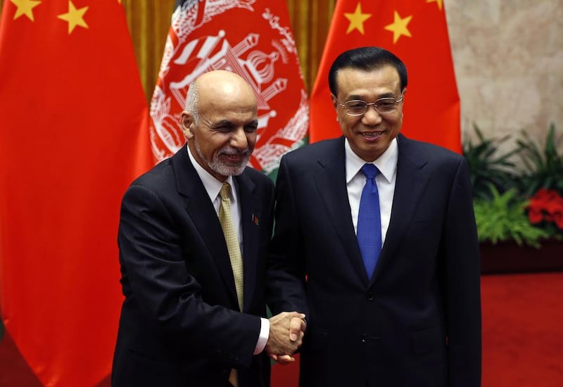 China's premier Li Keqiang, right, with Afghanistan's president Ashraf Ghani in Beijing last month. Kim Kyung-Hoon / AFP