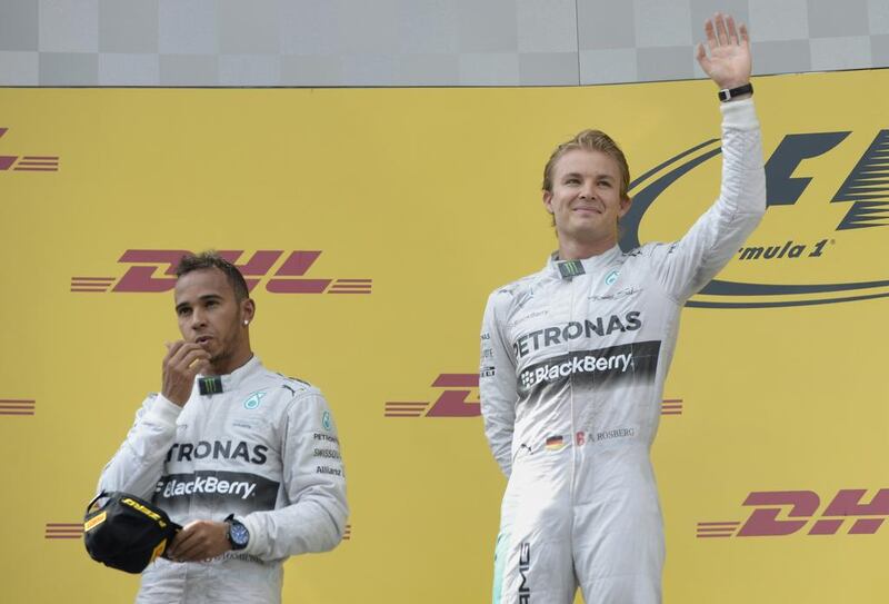 Nico Rosberg, right, admits things are still tense, and at times worse, between himself and teammate Lewis Hamilton, and that the situation has made things difficult for Mercedes GP executives Toto Wolff and Niki Lauda. Christof Stache / AFP