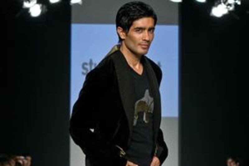 The designer Manish Malhotra opens his show at Dubai Fashion Week last month.