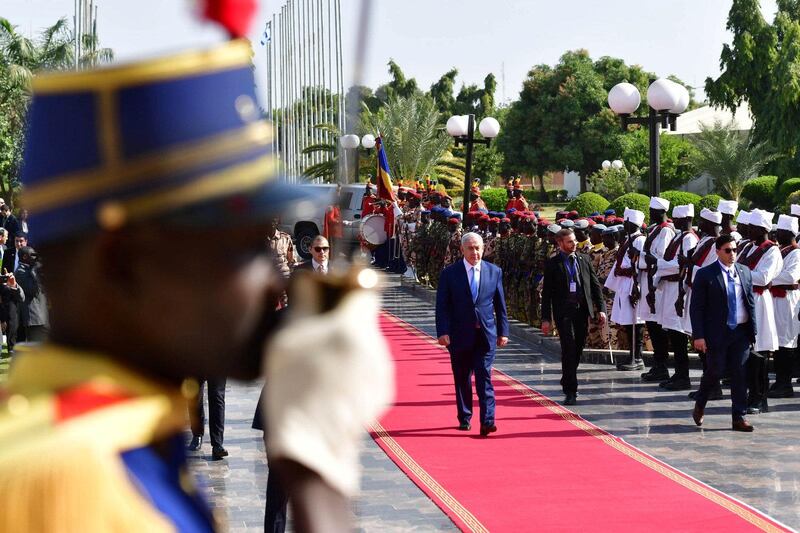Israeli Prime Minister Benjamin Netanyahu reviews an honour guard upon his arrival to N'Djamena, Chad January 20, 2019. Kobi Gideon/Government Press Office/Handout via REUTERS ATTENTION EDITORS - THIS PICTURE WAS PROVIDED BY A THIRD PARTY.