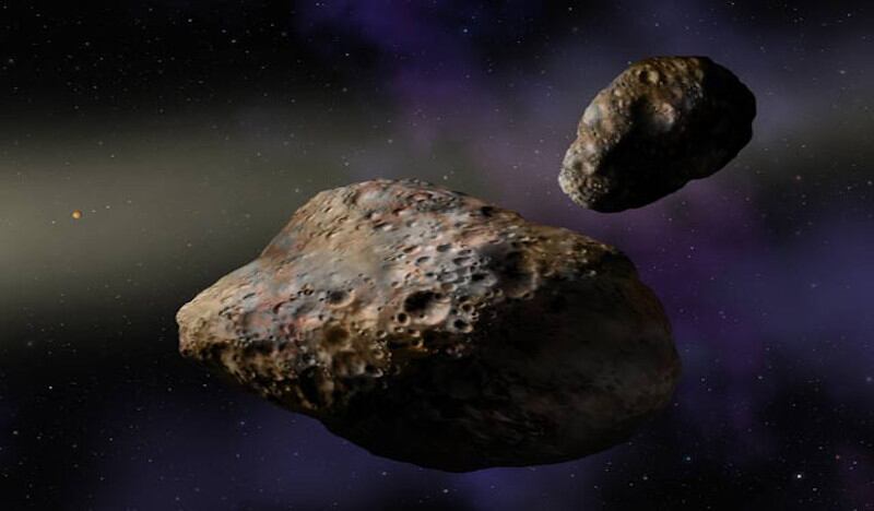 Space rocks in the main asteroid belt. Photo: Image via Lynette Cook/ W. M. Keck Observatory/ ROOM