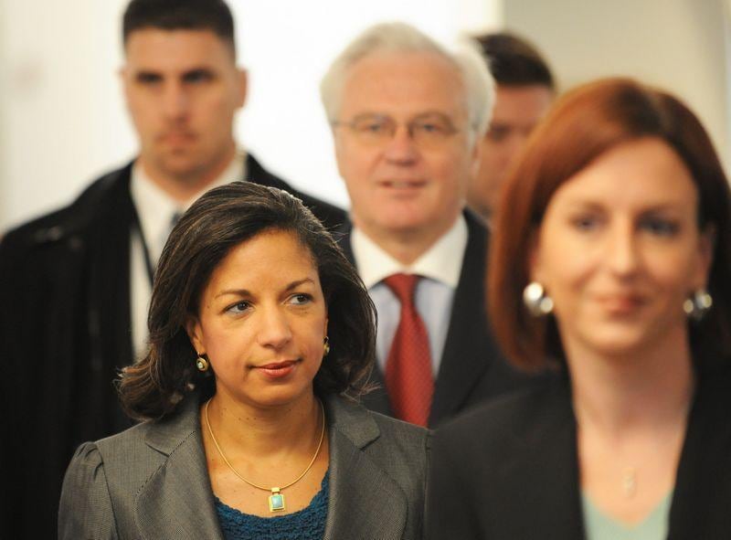Susan Rice (L), United States Ambassador to the United Nations arrives with Vitaly Churkin (C, rear), Russia's Ambassador to the UN May 19, 2010 for an event at UN headquarters in New York. The US on Tuesday announced that it would submit a resolution at the UN Security Council for a fourth round of sanctions against Iran for continuing with its nuclear program. The draft has the blessing of all five of the veto-wielding permanent members of the Security Council, including the usual standouts Russia and China. AFP PHOTO/Stan HONDA *** Local Caption ***  562724-01-08.jpg