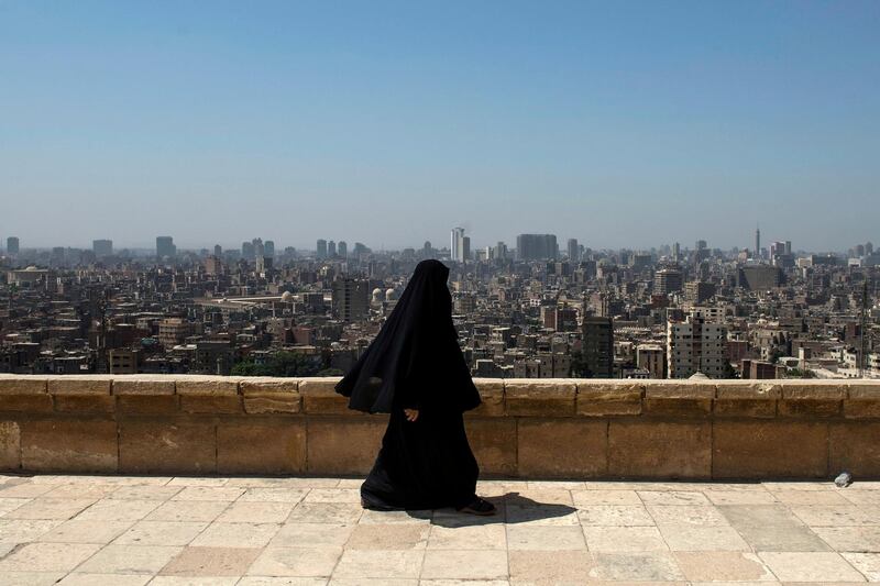 A woman walks at Salah Al Din citadel overlooking old Cairo, Egypt.  EPA