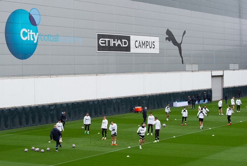 Manchester City players during training at the Etihad Campus. EPA