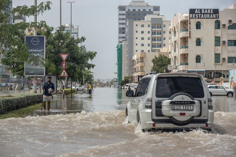 An SUV negotiates a flooded Fujairah city road after heavy rain hit parts of the Northern Emirates. Antonie Robertson / The National
