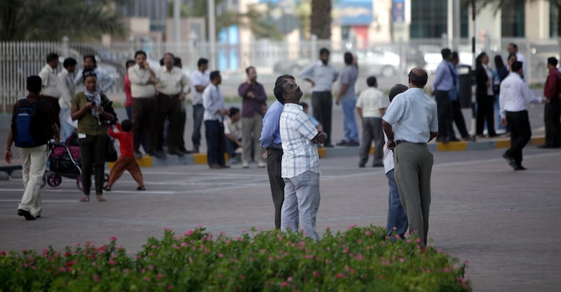 April 16, 2012 (Abu Dhabi) People evacuate near by buildings after a 7.8 magnitude earthquake originating in Iran was also felt in Abu Dhabi April 16, 2013. (Sammy Dallal / The National)