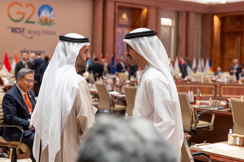 Sheikh Mohamed bin Hamad, Private Affairs Advisor in the Presidential Court, left, and Sheikh Abdullah bin Zayed, UAE Minister of Foreign Affairs, attend the first session of the G20 Summit. UAE Presidential Court